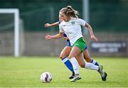 24 August 2024; Claire O’Reilly of Cabinteely in action against Hayley Phelan of Dungarvan United during the FAI Women’s Amateur Shield Final match between Cabinteely and Dungarvan United at Travers Insurances Park in Arklow, Wicklow. Photo by Seb Daly/Sportsfile