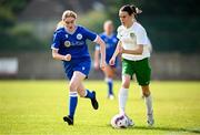 24 August 2024; Abbie Molloy of Cabinteely in action against Rebecca Hogan of Dungarvan United during the FAI Women’s Amateur Shield Final match between Cabinteely and Dungarvan United at Travers Insurances Park in Arklow, Wicklow. Photo by Seb Daly/Sportsfile
