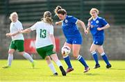 24 August 2024; Eimear Fennell of Dungarvan United in action against Sinead Gaynor of Cabinteely during the FAI Women’s Amateur Shield Final match between Cabinteely and Dungarvan United at Travers Insurances Park in Arklow, Wicklow. Photo by Seb Daly/Sportsfile