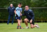 25 August 2024; Declan O'Sullivan, former Kerry footballer and coach of Cahersiveen, Kerry, talking to Robbie O'Sullivan during their match against Kilbride, Roscommon, in Gaelic Football U10 & O7 Boys/Girls/Mixed during the Cairn Community Games National Outdoor Teams Finals at SETU Pitches and Running Track in Carlow. Photo by Piaras Ó Mídheach/Sportsfile