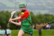25 August 2024; Megan O'Connor of Inniskeen, Monaghan, in action against Clarecastle-Ballyea, Clare, in the Camogie U14 & O10 Girls during the Cairn Community Games National Outdoor Teams Finals at SETU Pitches and Running Track in Carlow. Photo by Piaras Ó Mídheach/Sportsfile