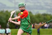 25 August 2024; Megan O'Connor of Inniskeen, Monaghan, in action against Clarecastle-Ballyea, Clare, in the Camogie U14 & O10 Girls during the Cairn Community Games National Outdoor Teams Finals at SETU Pitches and Running Track in Carlow. Photo by Piaras Ó Mídheach/Sportsfile
