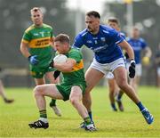 25 August 2024; Brian Darby of Rhode in action against Aaron Leavy of Tullamore during the Offaly Senior Club Football Championship Group 1 Round 3 match between Rhode and Tullamore at Daingean GAA Club in Offaly. Photo by Brendan Moran/Sportsfile