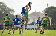 25 August 2024; Aaron Leavy of Tullamore and Ruairi McNamee of Rhode contest a kickouot during the Offaly Senior Club Football Championship Group 1 Round 3 match between Rhode and Tullamore at Daingean GAA Club in Offaly. Photo by Brendan Moran/Sportsfile