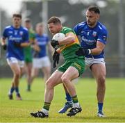 25 August 2024; Brian Darby of Rhode in action against Aaron Leavy of Tullamore during the Offaly Senior Club Football Championship Group 1 Round 3 match between Rhode and Tullamore at Daingean GAA Club in Offaly. Photo by Brendan Moran/Sportsfile