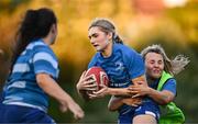 27 August 2024; Anna Doyle is tackled by Aoife Dalton during a Leinster rugby women's training session at The High School in Rathgar, Dublin. Photo by Shauna Clinton/Sportsfile