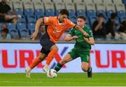 28 August 2024; Berkay Özcan of Basaksehir in action against Kian Leavy of St Patrick's Athletic during the UEFA Conference League play-off second leg match between Istanbul Basaksehir and St Patrick's Athletic at Basaksehir Faith Terim Stadium in Istanbul, Türkiye. Photo by Ozan Emre Oktay/Sportsfile
