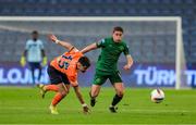 28 August 2024; Kian Leavy of St Patrick's Athletic in action against Hamza Güreler of Basaksehir during the UEFA Conference League play-off second leg match between Istanbul Basaksehir and St Patrick's Athletic at Basaksehir Faith Terim Stadium in Istanbul, Türkiye. Photo by Ozan Emre Oktay/Sportsfile
