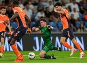 28 August 2024; Kian Leavy of St Patrick's Athletic in action against Onur Ergün, right, and Jerome Opoku of Istanbul Basaksehir during the UEFA Conference League play-off second leg match between Istanbul Basaksehir and St Patrick's Athletic at Basaksehir Faith Terim Stadium in Istanbul, Türkiye. Photo by Ozan Emre Oktay/Sportsfile