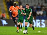 28 August 2024; Kian Leavy of St Patrick's Athletic in action against Philippe Kény of Istanbul Basaksehir during the UEFA Conference League play-off second leg match between Istanbul Basaksehir and St Patrick's Athletic at Basaksehir Faith Terim Stadium in Istanbul, Türkiye. Photo by Ozan Emre Oktay/Sportsfile