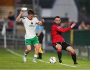 30 August 2024; Shane Elworthy of Longford Town in action against Cathal O'Sullivan of Cork City during the SSE Airtricity Men's First Division match between Cork City and Longford Town at Turner's Cross in Cork. Photo by Michael P Ryan/Sportsfile