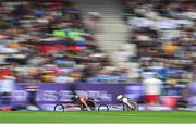 31 August 2024; Shauna Bocquet of Ireland, right, during the women's 5000m T54 final on day three of the Paris 2024 Paralympic Games at Stade de France in Paris, France. Photo by Ramsey Cardy/Sportsfile