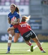 31 August 2024; Ella Roberts of Leinster is tackled by Aoife Corey of Munster during the Vodafone Women’s Interprovincial Championship final between Leinster and Munster at the Kingspan Stadium in Belfast. Photo by Shauna Clinton/Sportsfile