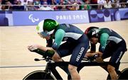 1 September 2024; Katie George Dunlevy, right, and pilot Eve McCrystal of Ireland in action during the women's B 3000m individual pursuit qualifying race on day four of the Paris 2024 Paralympic Games at Vélodrome de Saint-Quentin-en-Yvelines in Paris, France. Photo by Harry Murphy/Sportsfile