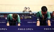 1 September 2024; Martin Gordon, left, and Eoin Mullen of Ireland react after being knocked off the podium in the men's B 1000m time trial final on day four of the Paris 2024 Paralympic Games at Vélodrome de Saint-Quentin-en-Yvelines in Paris, France. Photo by Harry Murphy/Sportsfile