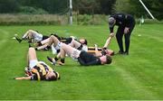 1 September 2024; Crossmaglen Rangers manager Anthony Cunningham talking with Paul McKeown during the warm-up before the Armagh Senior Club Football Championship Group B second round match between High Moss Sarsfields and Crossmaglen Rangers at Fr Dan McGeown Park in Derrytrasna, Armagh. Photo by Piaras Ó Mídheach/Sportsfile