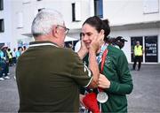 1 September 2024; Katie George Dunlevy of Ireland celebrate with her father John after winning silver in the women's B 3000m individual pursuit final on day four of the Paris 2024 Paralympic Games at Vélodrome de Saint-Quentin-en-Yvelines in Paris, France. Photo by Harry Murphy/Sportsfile