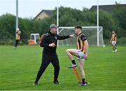 1 September 2024; Crossmaglen Rangers manager Anthony Cunningham speaking with Harry Cumiskey during the warm-up before the Armagh Senior Club Football Championship Group B second round match between High Moss Sarsfields and Crossmaglen Rangers at Fr Dan McGeown Park in Derrytrasna, Armagh. Photo by Piaras Ó Mídheach/Sportsfile