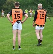 1 September 2024; Crossmaglen Rangers players wearing 'Stringer 15' on their warm-up bibs, in recognition of the nickname and squad number of their late team-mate Caolan Finnegan, who passed away recently, before the Armagh Senior Club Football Championship Group B second round match between High Moss Sarsfields and Crossmaglen Rangers at Fr Dan McGeown Park in Derrytrasna, Armagh. Photo by Piaras Ó Mídheach/Sportsfile