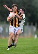 1 September 2024; Oisín O'Neill of Crossmaglen Rangers in action against Sean McAlinden of High Moss Sarsfields during the Armagh Senior Club Football Championship Group B second round match between High Moss Sarsfields and Crossmaglen Rangers at Fr. Dan McGeown Park in Derrytrasna, Armagh. Photo by Piaras Ó Mídheach/Sportsfile
