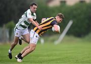 1 September 2024; Oisín O'Neill of Crossmaglen Rangers in action against Sean McAlinden of High Moss Sarsfields during the Armagh Senior Club Football Championship Group B second round match between High Moss Sarsfields and Crossmaglen Rangers at Fr. Dan McGeown Park in Derrytrasna, Armagh. Photo by Piaras Ó Mídheach/Sportsfile