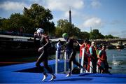 2 September 2024; Chloe MacCombe, right, and guide Catherine A Sands of Ireland in action during the women's PTVI race on day five of the Paris 2024 Paralympic Games at Pont Alexandre III in Paris, France. Photo by Ramsey Cardy/Sportsfile