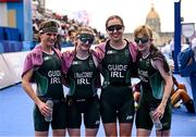 2 September 2024; Ireland triathletes, from left, guide Eimear Nicholls, Judith MacCombe, guide Catherine A Sands, and Chloe MacCombe, after the women's PTVI race on day five of the Paris 2024 Paralympic Games at Pont Alexandre III in Paris, France. Photo by Ramsey Cardy/Sportsfile
