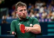 2 September 2024; Colin Judge of Ireland in action against Feng Panfeng of China during their men's singles MS11 round of 16 match on day five of the Paris 2024 Paralympic Games at South Paris Arena in Paris, France. Photo by Harry Murphy/Sportsfile