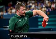 2 September 2024; Colin Judge of Ireland in action against Feng Panfeng of China during their men's singles MS11 round of 16 match on day five of the Paris 2024 Paralympic Games at South Paris Arena in Paris, France. Photo by Harry Murphy/Sportsfile