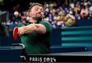 2 September 2024; Colin Judge of Ireland in action against Feng Panfeng of China during their men's singles MS11 round of 16 match on day five of the Paris 2024 Paralympic Games at South Paris Arena in Paris, France. Photo by Harry Murphy/Sportsfile