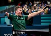 2 September 2024; Colin Judge of Ireland celebrates winning a point against Feng Panfeng of China during their men's singles MS11 round of 16 match on day five of the Paris 2024 Paralympic Games at South Paris Arena in Paris, France. Photo by Harry Murphy/Sportsfile