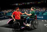 2 September 2024; Colin Judge of Ireland, right, shakes hands with winner Feng Panfeng of China after the men's singles MS11 round of 16 match on day five of the Paris 2024 Paralympic Games at South Paris Arena in Paris, France. Photo by Harry Murphy/Sportsfile
