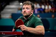 2 September 2024; Colin Judge of Ireland in action against Feng Panfeng of China during their men's singles MS11 round of 16 match on day five of the Paris 2024 Paralympic Games at South Paris Arena in Paris, France. Photo by Harry Murphy/Sportsfile