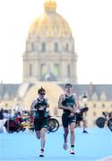 2 September 2024; Chloe MacCombe, left, and guide Catherine A Sands of Ireland in action during the women's PTVI race on day five of the Paris 2024 Paralympic Games at Pont Alexandre III in Paris, France. Photo by Ramsey Cardy/Sportsfile