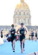 2 September 2024; Chloe MacCombe, left, and guide Catherine A Sands of Ireland in action during the women's PTVI race on day five of the Paris 2024 Paralympic Games at Pont Alexandre III in Paris, France. Photo by Ramsey Cardy/Sportsfile