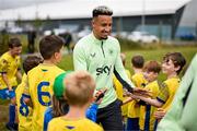 3 September 2024; Callum Robinson is welcomed by Manortown FC players to their Republic of Ireland training session at the FAI National Training Centre in Abbotstown, Dublin. Photo by Stephen McCarthy/Sportsfile