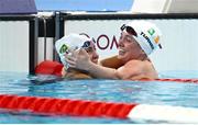 3 September 2024; Nicole Turner of Ireland, right, and Mayara Petzold of Brazil after the Women's 50m Butterfly S6 Final on day six of the Paris 2024 Paralympic Games at La Defense Arena in Paris, France. Photo by Ramsey Cardy/Sportsfile