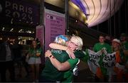3 September 2024; Bronze medallist Orla Comerford of Ireland is greeted by her mother Siobhán after her women's T13 100m final on day six of the Paris 2024 Paralympic Games at Stade de France in Paris, France. Photo by Harry Murphy/Sportsfile