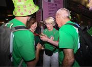 3 September 2024; Bronze medallist Orla Comerford of Ireland is greeted by her parents Siobhán and Ger after her women's T13 100m final on day six of the Paris 2024 Paralympic Games at Stade de France in Paris, France. Photo by Harry Murphy/Sportsfile