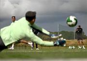 4 September 2024; Goalkeeper Max O'Leary saves a shot from Callum Robinson during a Republic of Ireland training session at the FAI National Training Centre in Abbotstown, Dublin. Photo by Stephen McCarthy/Sportsfile