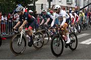6 September 2024; Ronan Grimes of Ireland, centre, in action during the Men's C4 - 5 road race on day nine of the Paris 2024 Paralympic Games at Clichy-sous- Bois in Paris, France. Photo by Harry Murphy/Sportsfile
