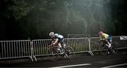 6 September 2024; Ronan Grimes of Ireland and Alistair Donohoe of Australia, right, in action during the Men's C4 - 5 road race on day nine of the Paris 2024 Paralympic Games at Clichy-sous- Bois in Paris, France. Photo by Harry Murphy/Sportsfile