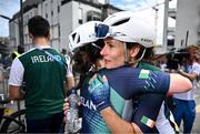 6 September 2024; Katie-George Dunlevy, right, and pilot Linda Kelly of Ireland cross the line after finishing second in the Women's B road race on day nine of the Paris 2024 Paralympic Games at Clichy-sous- Bois in Paris, France. Photo by Harry Murphy/Sportsfile