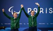 6 September 2024; Katie-George Dunlevy, right, and pilot Linda Kelly of Ireland celebrate after winning silver by finishing second in the Women's B road race on day nine of the Paris 2024 Paralympic Games at Clichy-sous- Bois in Paris, France. Photo by Harry Murphy/Sportsfile