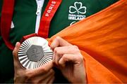 6 September 2024; Katie-George Dunlevy holds her silver medal after finishing second with pilot Linda Kelly in Women's B road race during the Women's B road race on day nine of the Paris 2024 Paralympic Games at Clichy-sous- Bois in Paris, France. Photo by Harry Murphy/Sportsfile