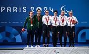 6 September 2024; The women's B road race podium, from left, pilot Linda Kelly and Katie-George Dunley of Ireland, silver, pilot Jenny Holl and Sophie Unwin of Great Britain, gold, and pilot Corrine Hall and Lora Fachie of Great Britain, bronze, on day nine of the Paris 2024 Paralympic Games at Clichy-sous-bois in Paris, France. Photo by Harry Murphy/Sportsfile