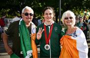 6 September 2024; Katie-George Dunlevy of Ireland, centre, with parents John and Alana after winning silver in the women's B road race on day nine of the Paris 2024 Paralympic Games at Clichy-sous-bois in Paris, France. Photo by Harry Murphy/Sportsfile