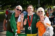 6 September 2024; Katie-George Dunlevy of Ireland, centre, with parents John and Alana after winning silver in the women's B road race on day nine of the Paris 2024 Paralympic Games at Clichy-sous-bois in Paris, France. Photo by Harry Murphy/Sportsfile