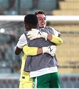 6 September 2024; Republic of Ireland goalkeeper Joshua  Keeley celebrates with teammate Aidomo  Emakhu after the UEFA European U21 Championship qualifier match between Turkiye and Republic of Ireland at Esenler Stadium in Istanbul, Turkey. Photo by Gokhan Kilincer/Sportsfile