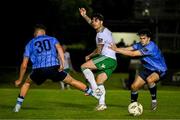 6 September 2024; Ruairí Keating of Cork City in action against Adam Verdon of UCD during the SSE Airtricity Men's First Division match between UCD and Cork City at UCD Bowl in Belfield, Dublin. Photo by David Fitzgerald/Sportsfile